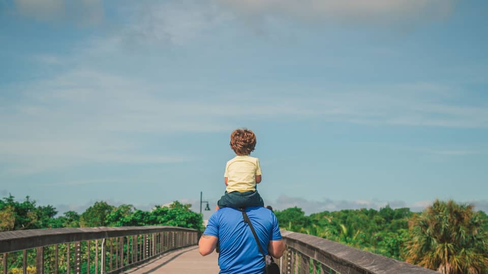 walking down the bridge of Baker park in Naples Florida in southwest Florida public park