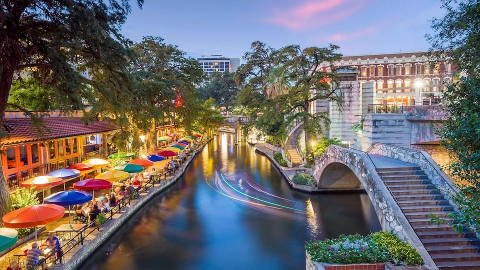 River walk in San Antonio city downtown skyline cityscape of Texas USA