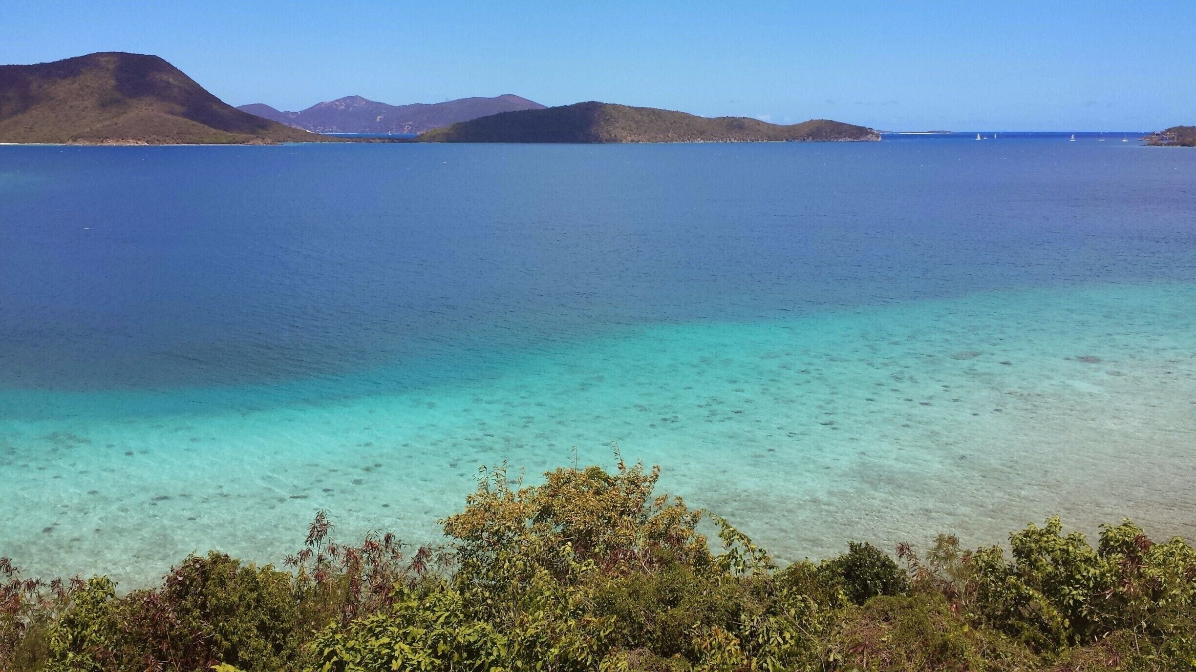 A piece of clear blue water on the way to the ruins of the plantation.