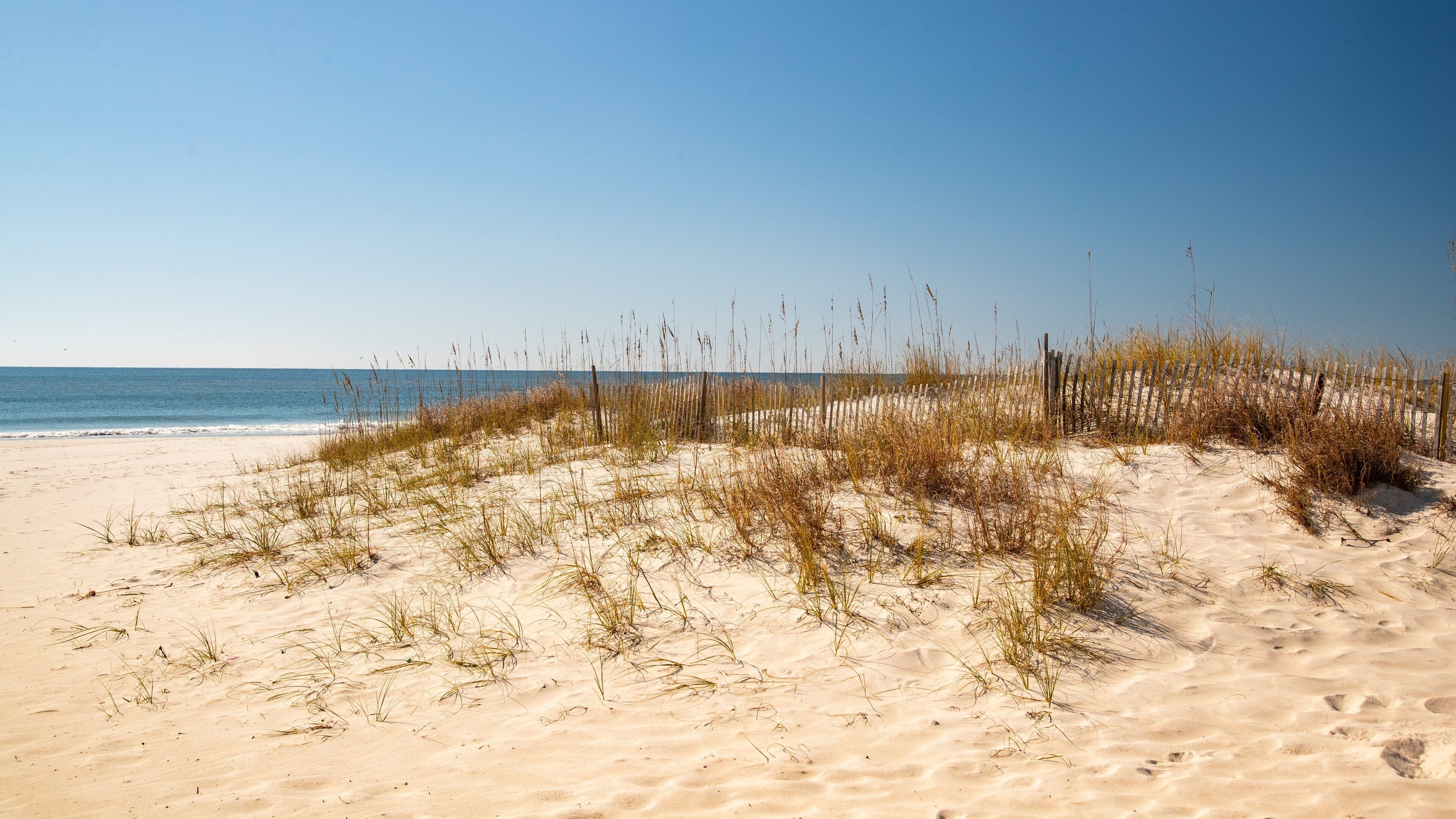 West Beach which includes a sandy beach and general coastal views
