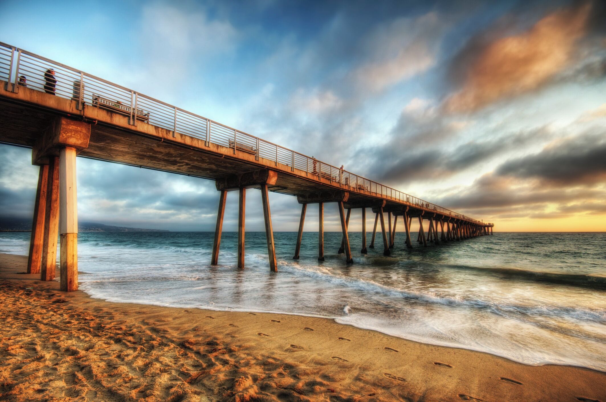 Pier with sea at sunset It connects Orange County with San Fernando Valley via Western Los Angeles