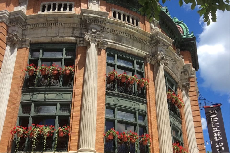 A historic building with ornate architecture, including columns and decorative moldings.