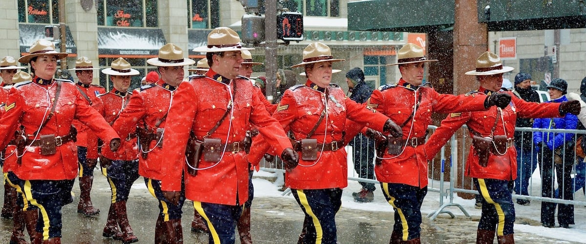Royal Canadian Mounted Polices match in the snow during St. Patrick Dayâs parade in Quebec City. This City has a large population of Irish.
#Canada #Quebec #QuebecCity #StPatrickDay #parade #snow #red #police #RCMP