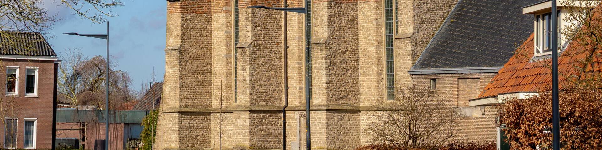 The Kiel Dorpskerk (Village Church) tower on the site of a chapel under blue sky, Olst is a town in the Dutch province of Overijssel, Located in the municipality of Olst-Wijhe, Deventer, Netherlands.