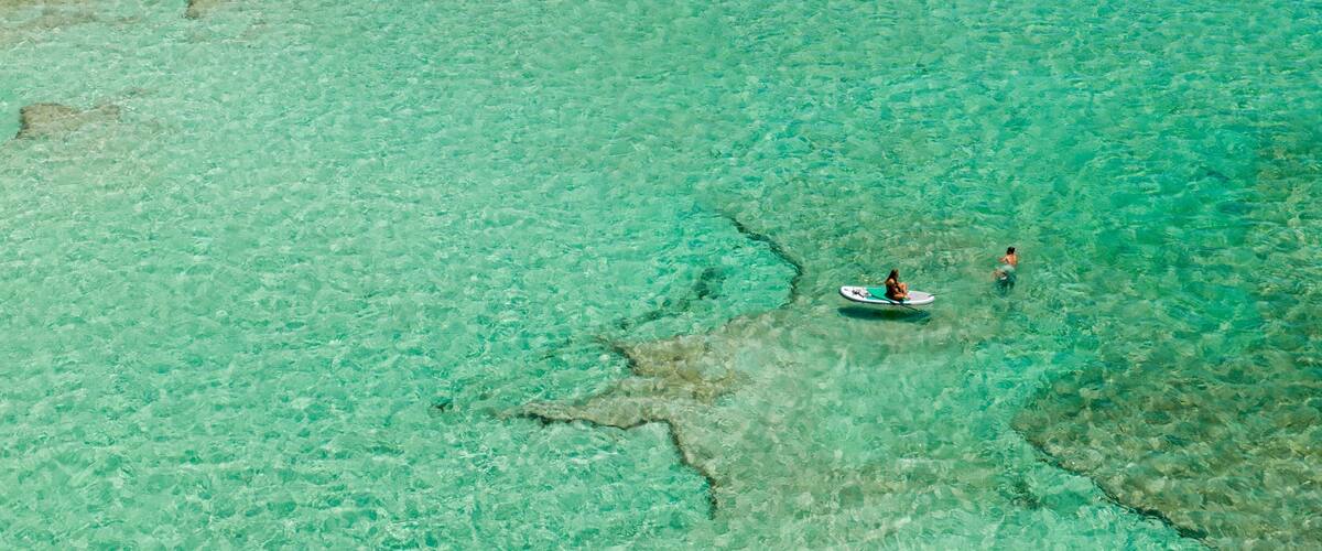 Grand Cul-de-Sac which includes boating, tropical scenes and general coastal views