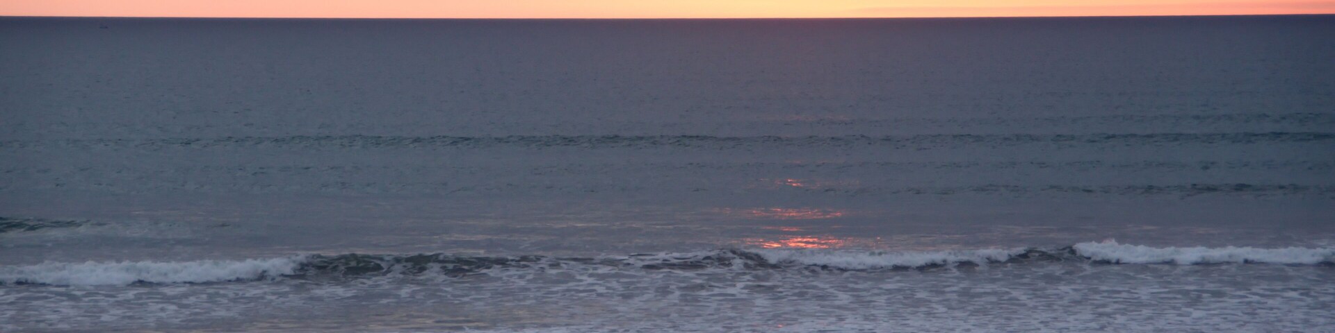 Sunset over the beach in Canoa, Ecuador