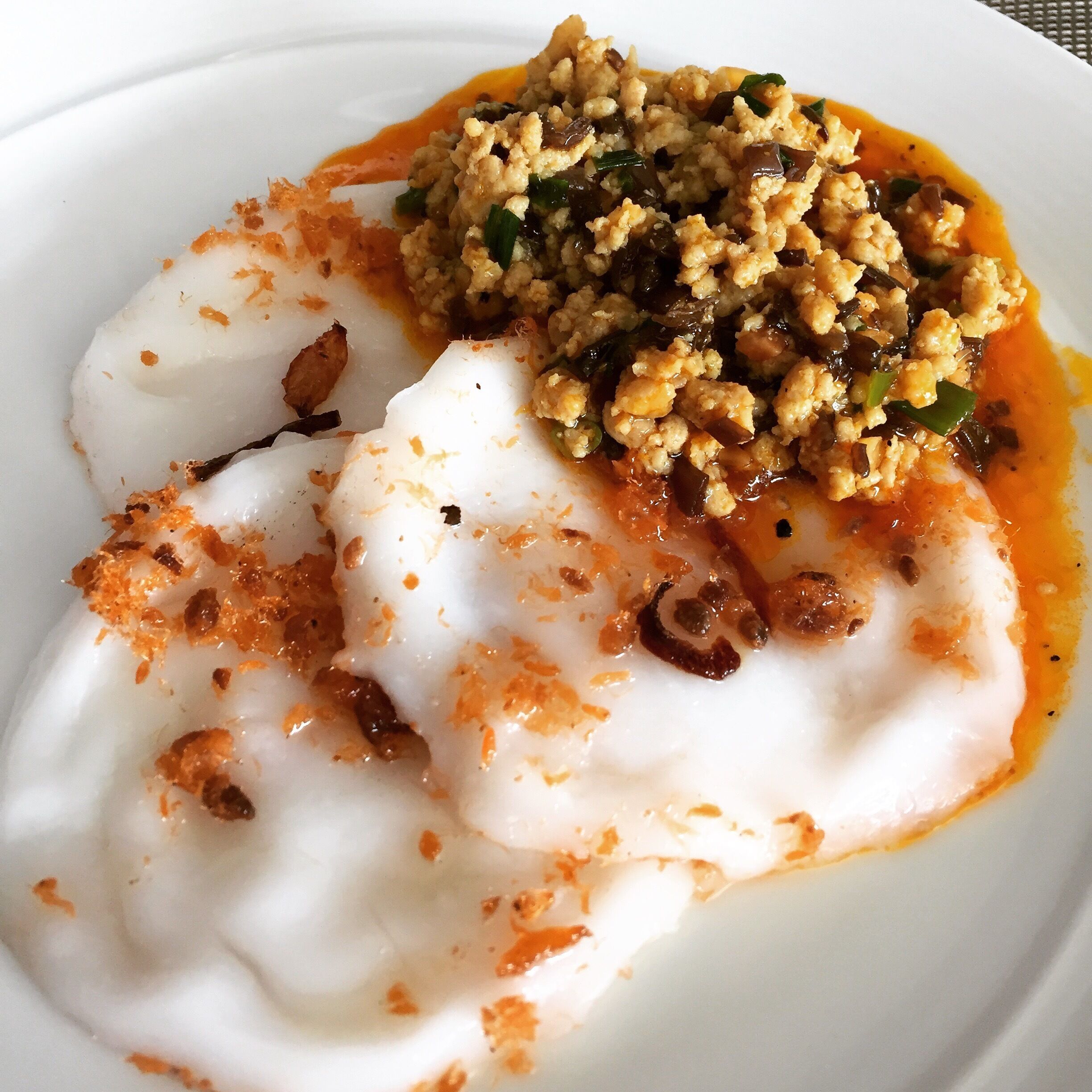 Must try their Bánh bèo or steamed rice cakes which they serve at breakfast. It is white in color and typically served with savory ingredients such as chopped dried or fresh shrimp, scallions, mung bean paste, crispy fried shallots, fish sauce, rice vinegar, and oil.