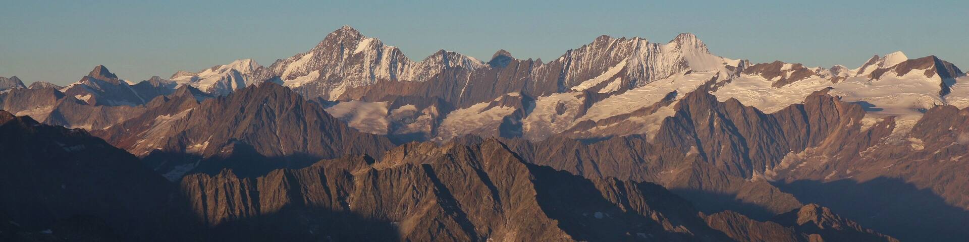High mountains in the Bernese Oberland at sunrise. View from Titlis, Switzerland.
