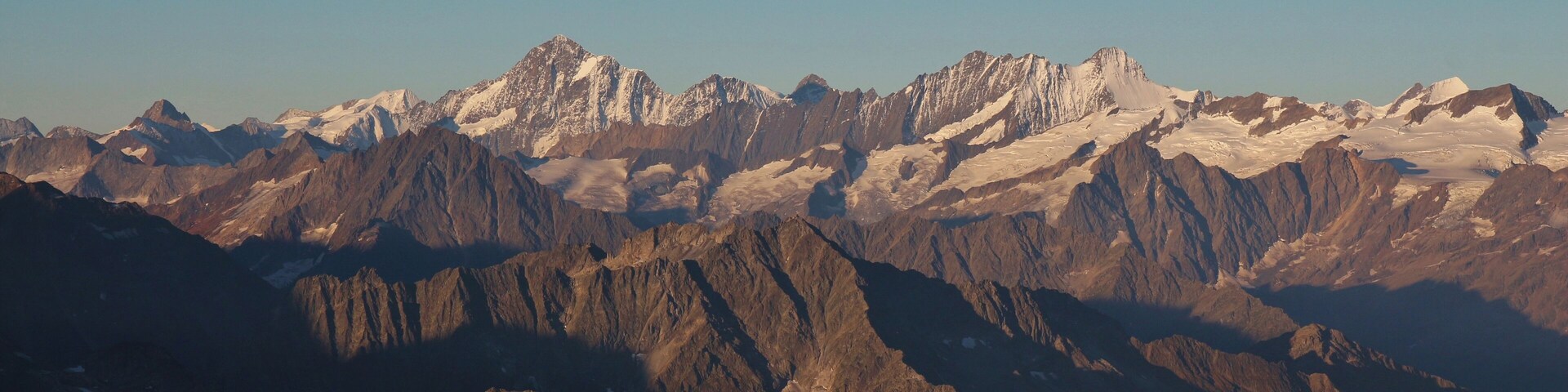 High mountains in the Bernese Oberland at sunrise. View from Titlis, Switzerland.