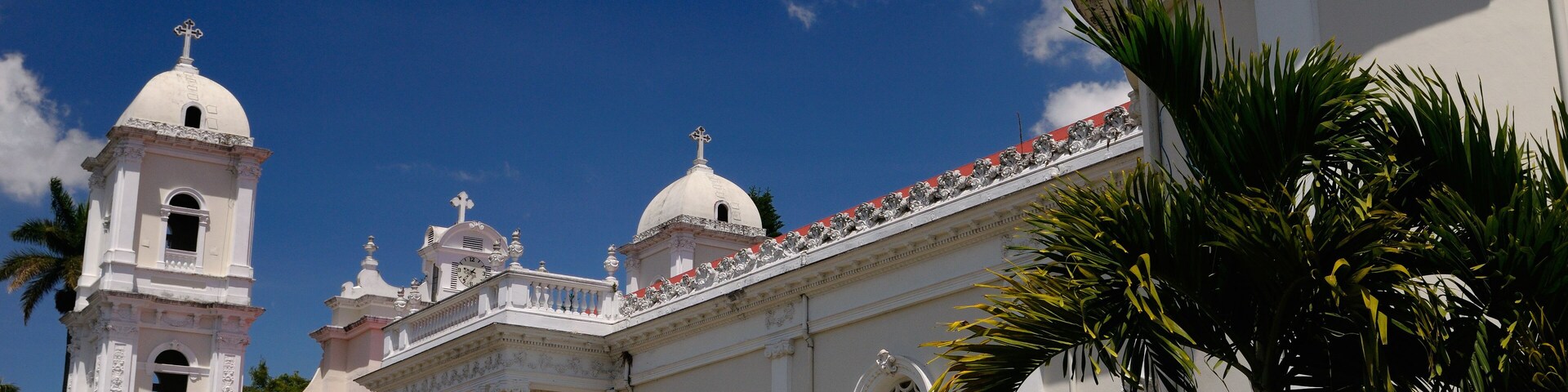 White Catholic church of Naranjo parish in Costa Rica on a sunny blue sky day