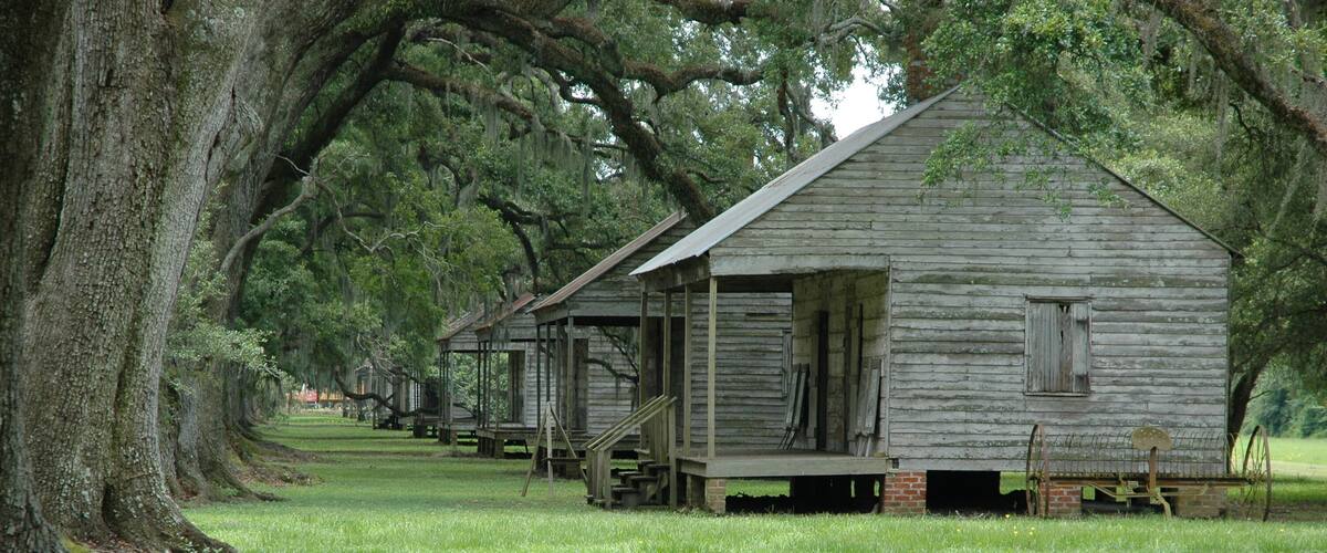 Slave cabins at Evergreen Plantation, located on the west side of the Mississippi River in St. John the Baptist Parish, constructed in 1790, Wallace, Louisiana, USA.
