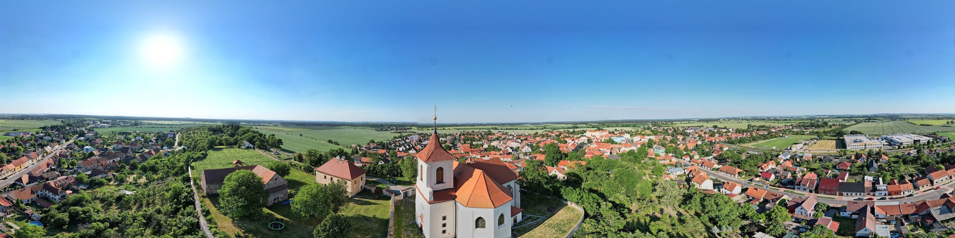 Kostel sv. Apolináře Sadská city Czech republic aerial panorama scenic view church in Sadska in Nymburk area