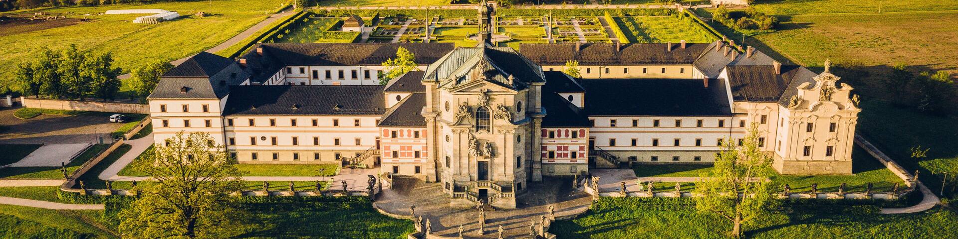 Kuks Hospital is a former care institute for military veterans in Kuks in the Trutnov district, operated between 1744 and 1938. It was the most generous institute of its kind in late Baroque Bohemia.