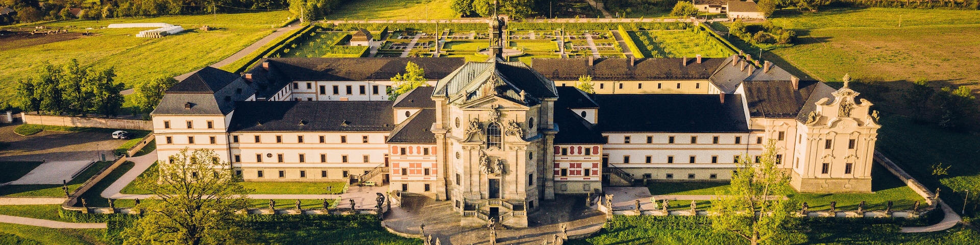 Kuks Hospital is a former care institute for military veterans in Kuks in the Trutnov district, operated between 1744 and 1938. It was the most generous institute of its kind in late Baroque Bohemia.