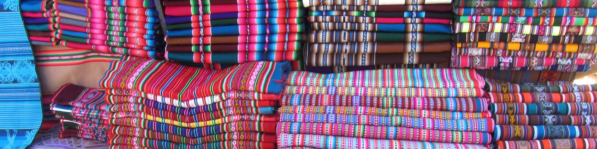 The village of Tarabuco is like stepping back in time...dusty streets, various local markets, selling anything from produce to household goods, to the textiles you see here. The streets around the main square are a riot of color with woven products like the picture here. You reach Tarabuco via a bus from Sucre. #patterns