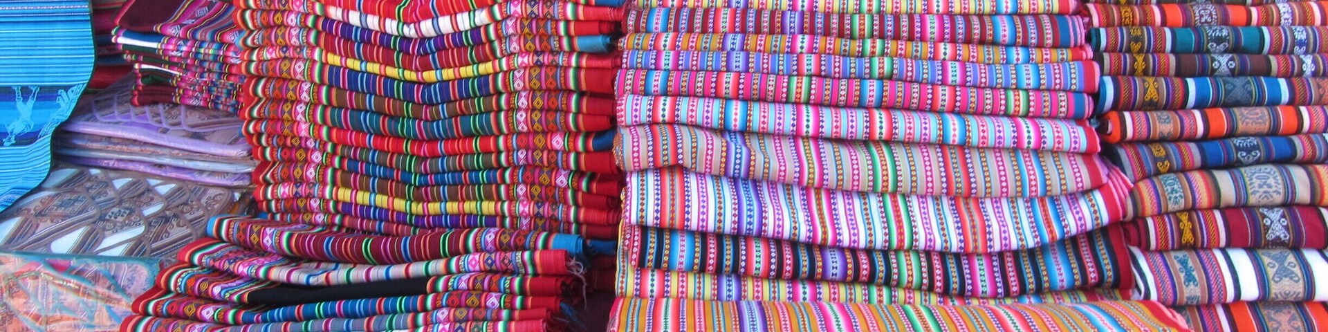 The village of Tarabuco is like stepping back in time...dusty streets, various local markets, selling anything from produce to household goods, to the textiles you see here. The streets around the main square are a riot of color with woven products like the picture here. You reach Tarabuco via a bus from Sucre. #patterns