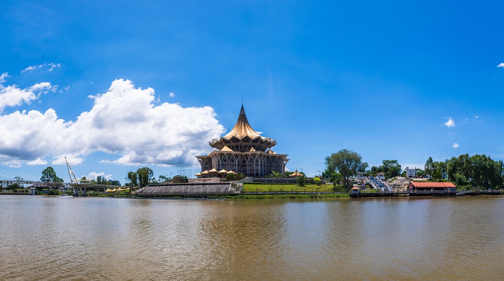 Kuching city waterfront panorama cityscape with river and landmarks in Sarawak, Malaysia.