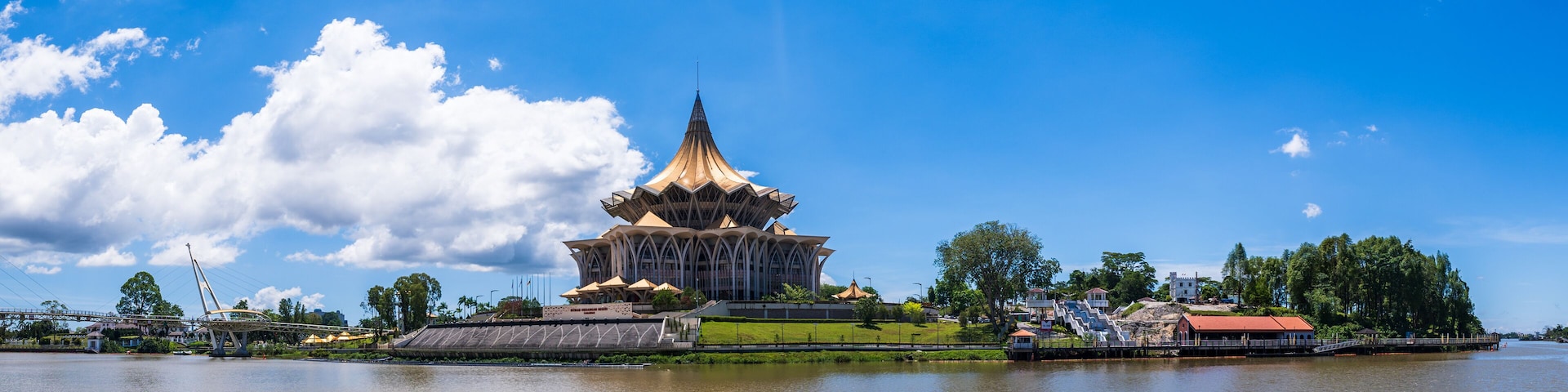 Kuching city waterfront panorama cityscape with river and landmarks in Sarawak, Malaysia.