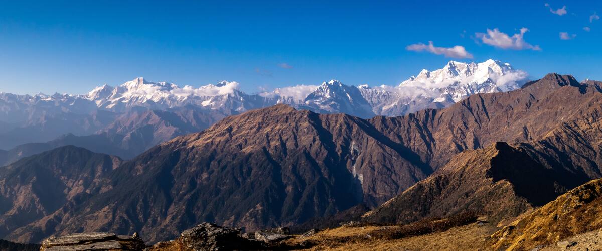 Panoramic view Himalayan mountains view from Chandrashila summit, Chopta. Chandrashila is a peak in the Himalayan ranges in Uttarakhand state of India. It lies at an altitude of 12,083 ft from the sea