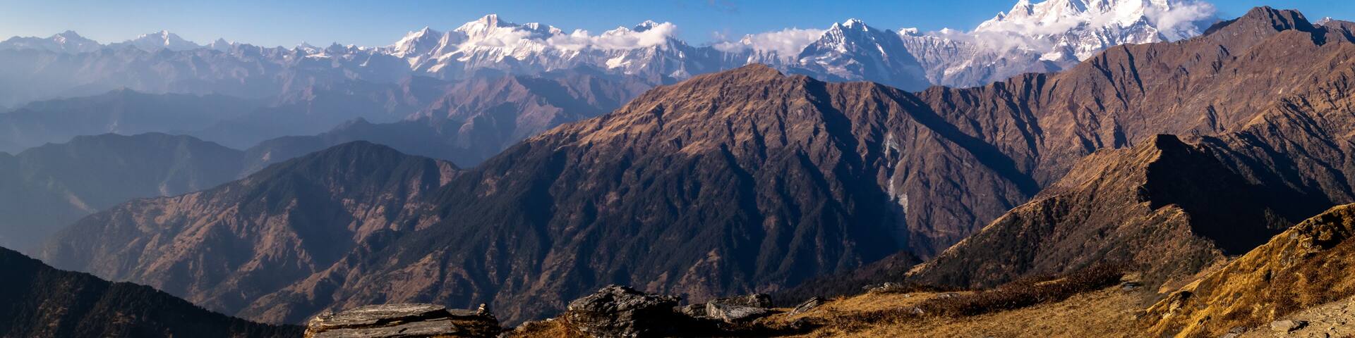 Panoramic view Himalayan mountains view from Chandrashila summit, Chopta. Chandrashila is a peak in the Himalayan ranges in Uttarakhand state of India. It lies at an altitude of 12,083 ft from the sea