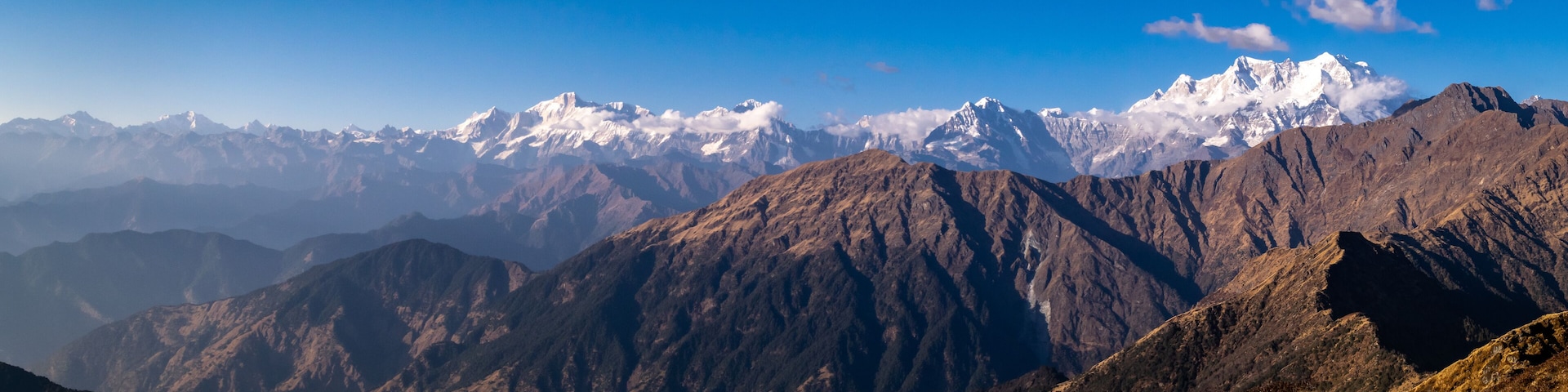 Panoramic view Himalayan mountains view from Chandrashila summit, Chopta. Chandrashila is a peak in the Himalayan ranges in Uttarakhand state of India. It lies at an altitude of 12,083 ft from the sea