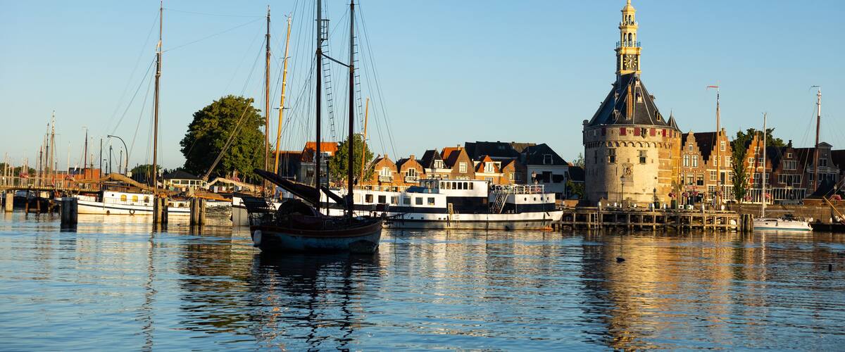 Scenic view of ancient Hoofdtoren tower standing at harbor of Dutch city of Hoorn