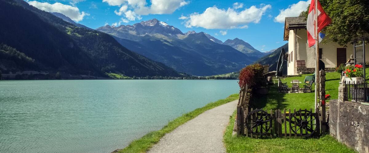 View on the lovely Lago di Poschiavo (Graubunden, Switzerland). Poschiavo is a municipality in the district of Bernina in the canton of Graubünden in Switzerland