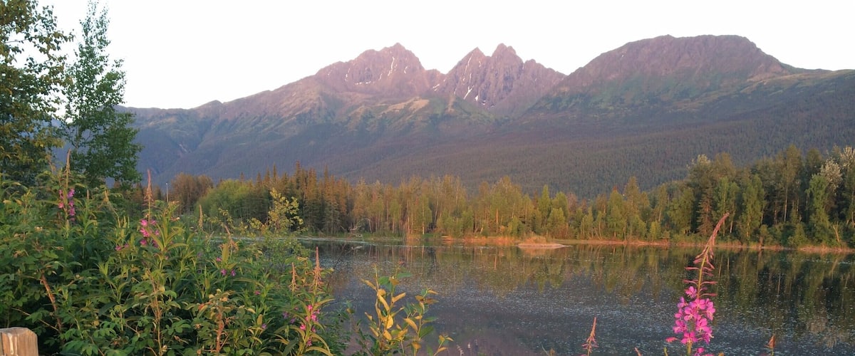 Warm midnight light - just about solstice day. Leisurely walk around the lake. Mosquitos however, but worth it for this snap.