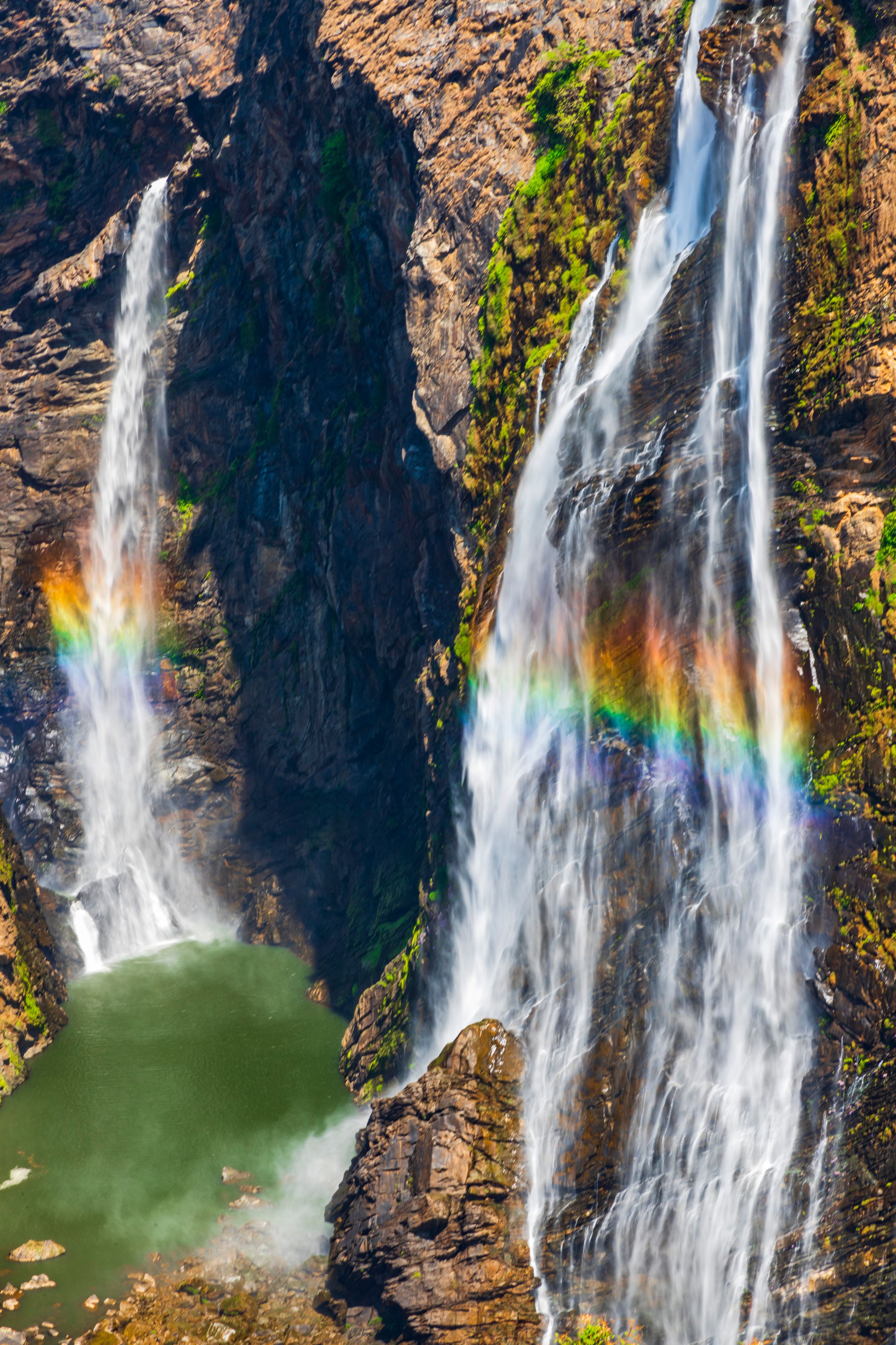 A waterfall with a rainbow.