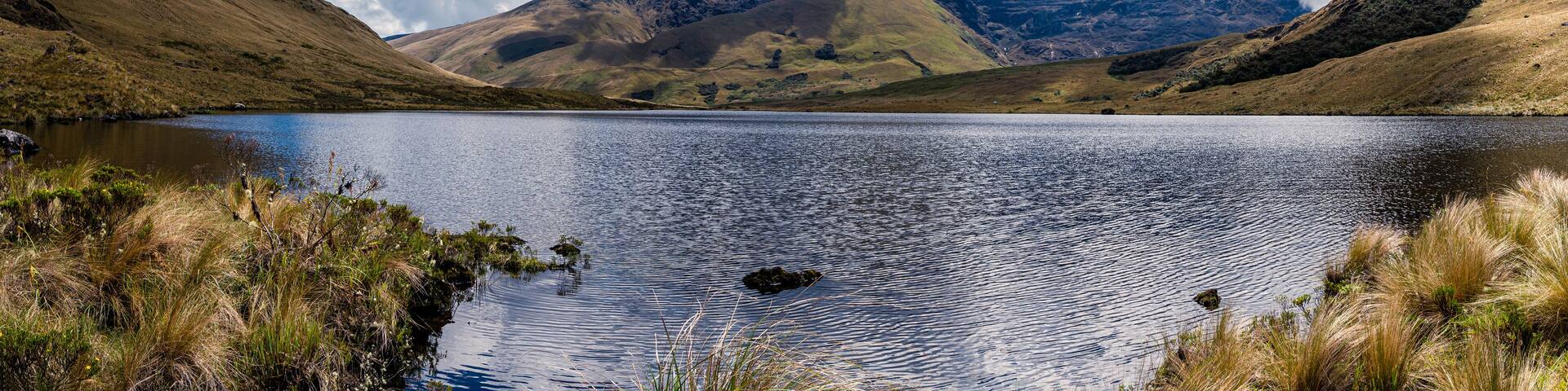 Lagoon at 4,000 meters above sea level in the Andes of Peru. Mountains and lagoon in the Andes of Peru. Area at risk of mining exploitation.