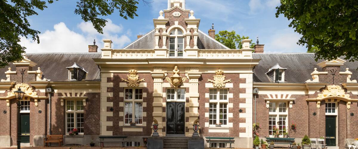 Asyl for old and infirm sailors; a courtyard consisting of 14 houses, built in 1872, in the municipality of Brielle in the Netherlands.