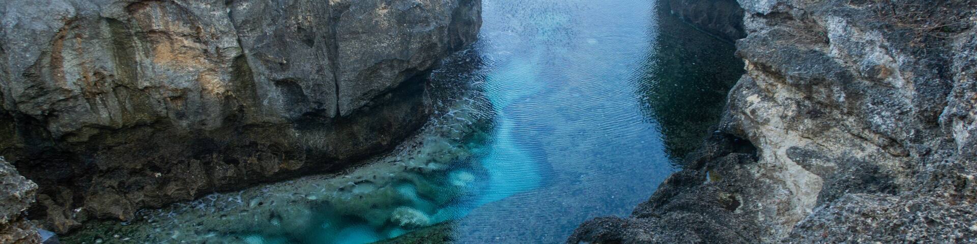 Natural, Clear Lagoon Between Cliffs Making a Bright Turquoise Billabong With Crystal Ocean Water Called Angels Billabong on Nusa Penida, Bali, Indonesia