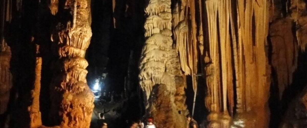 A cave with stalactites and stalagmites.