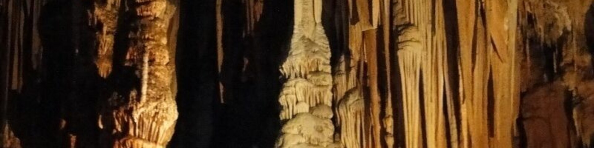 A cave with stalactites and stalagmites.