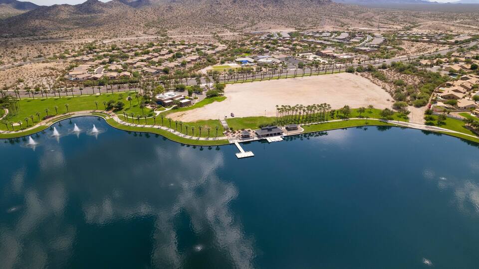 Aerial drone shot of Estrella Mountain Ranch and the North Lake in Starpoint Residents Club, Arizona
