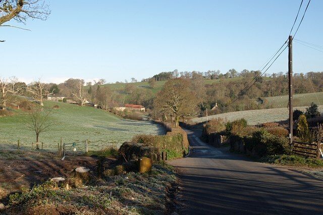 Lane at Wapperwell The lane from Ideford to Chudleigh drops down towards the Ugbrooke Stream valley from the bridge under the A380.