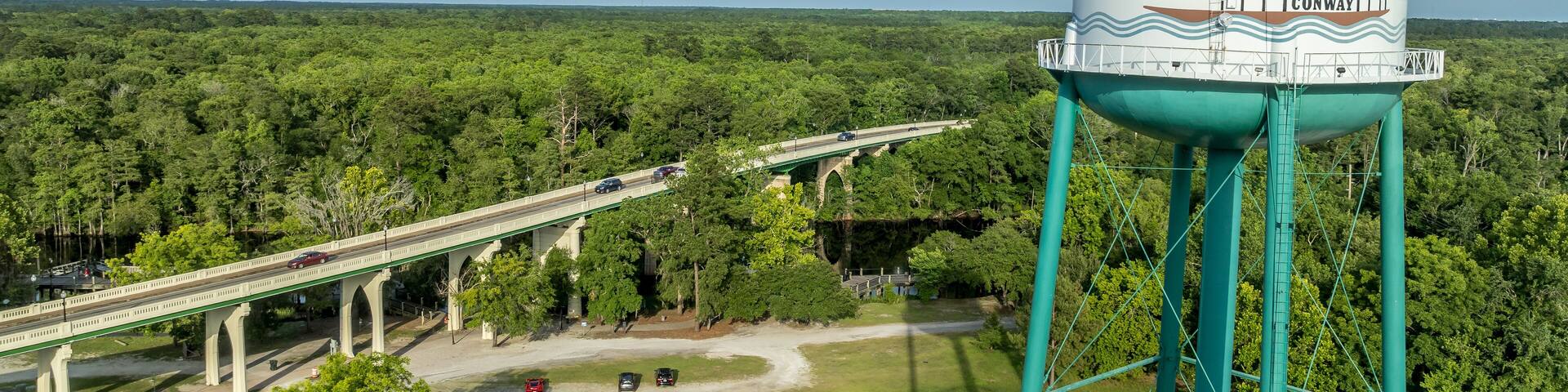 Aerial of Conway, small town on a bluff overlooking the Waccamaw River in South Carolina with typical main street, water tower, marina in Horry county
