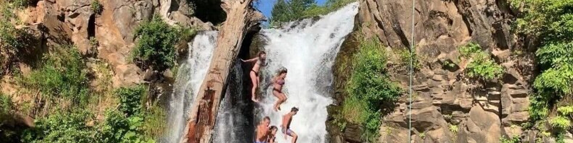 Very short walk to opening of waterfall. You can swim out to the log and jump off it, or climb on the side to get to the top of waterfall to jump off into water (about 15-20ft jump).
7•19•19