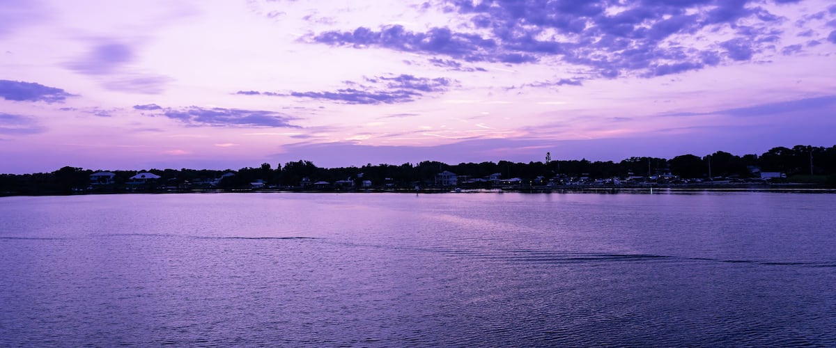 Scenic purple sunrise over the Sebastian River in Little Hollywood, Micco, Florida