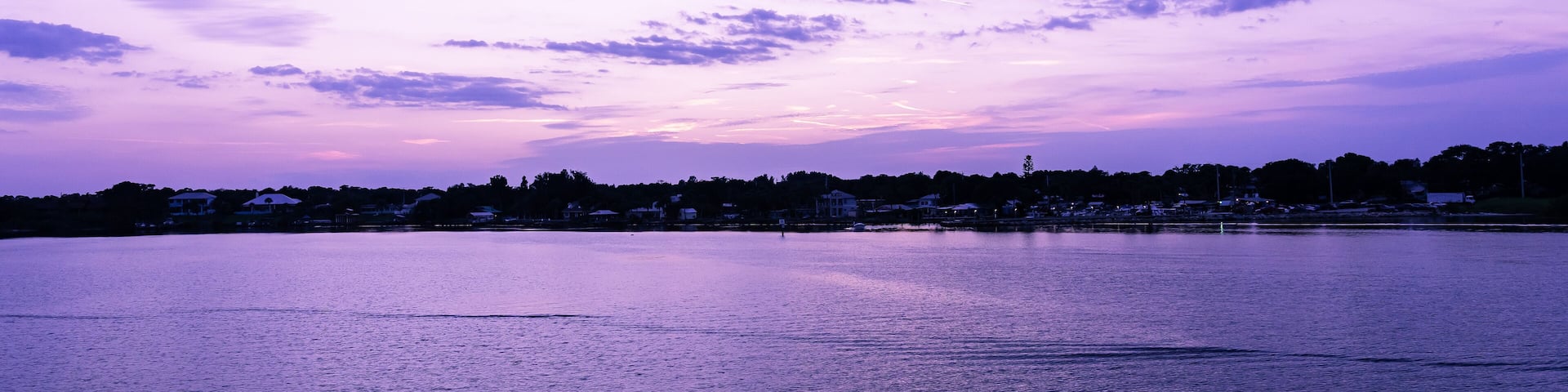 Scenic purple sunrise over the Sebastian River in Little Hollywood, Micco, Florida