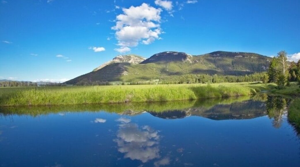 Reflections in pond of western mountains in Centennial Valley near Lakeview, MT