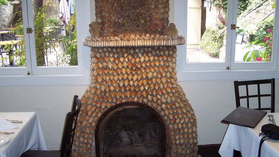 Fireplace made entirely of conch shells. Lovely place to have Sunday brunch.