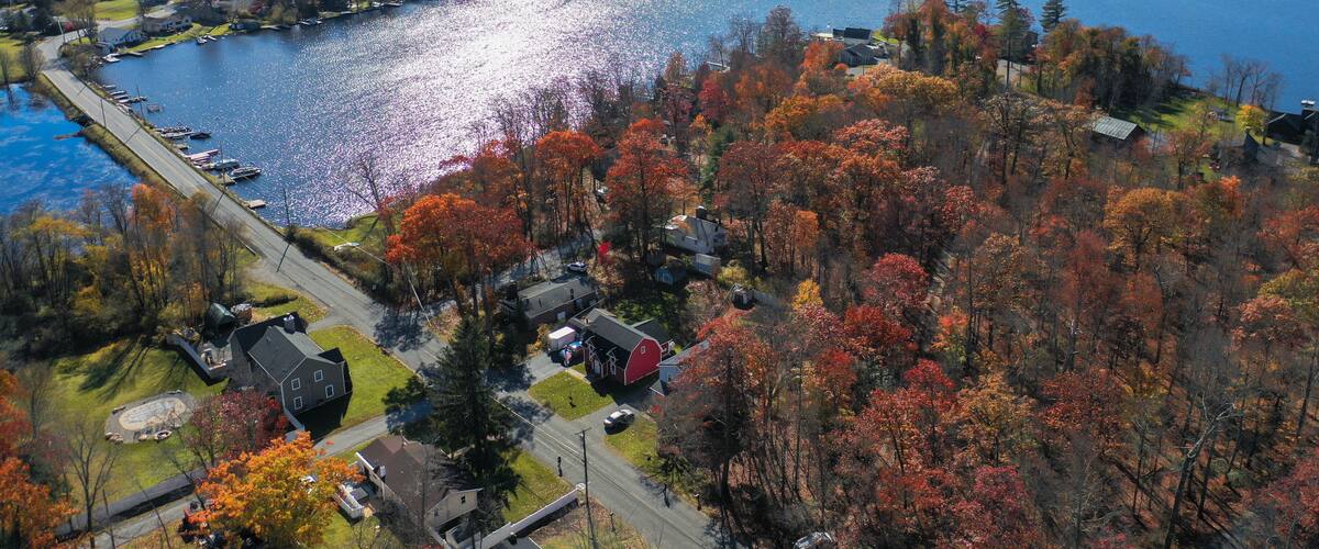 Culvers Lake Frankford NJ on a sunny autumn day with fall foliage aerial