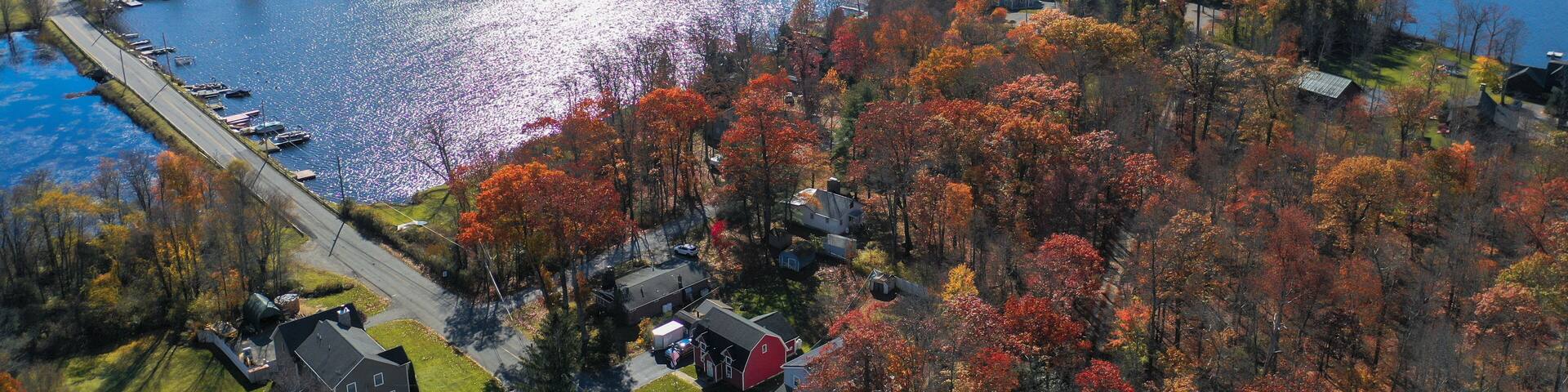 Culvers Lake Frankford NJ on a sunny autumn day with fall foliage aerial