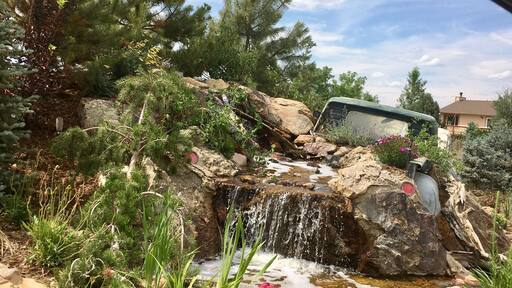The back view of their unique water feature at The Sprucery’s entrance to nursery.