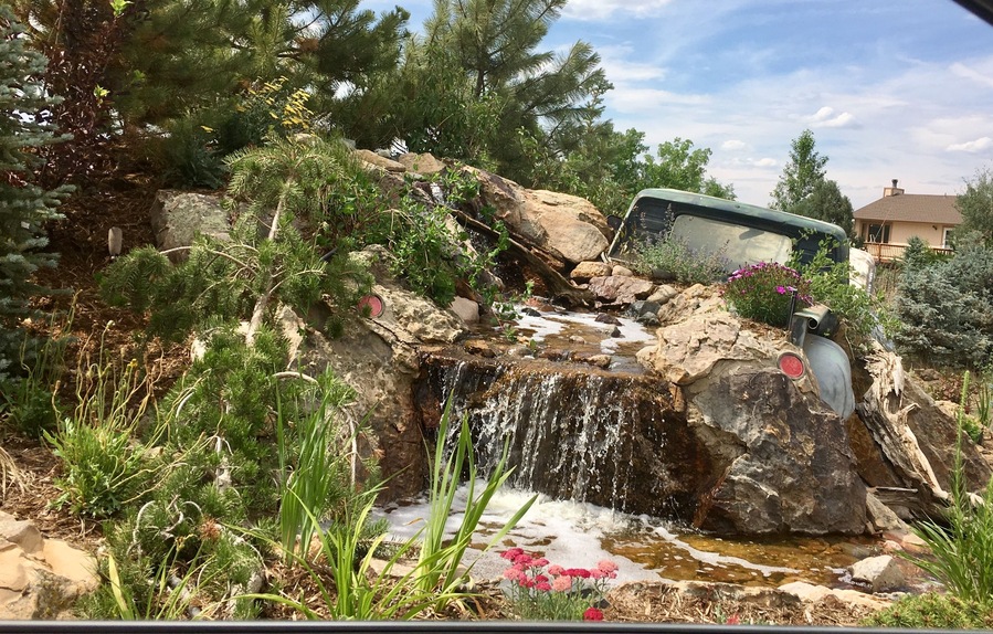 The back view of their unique water feature at The Sprucery’s entrance to nursery.