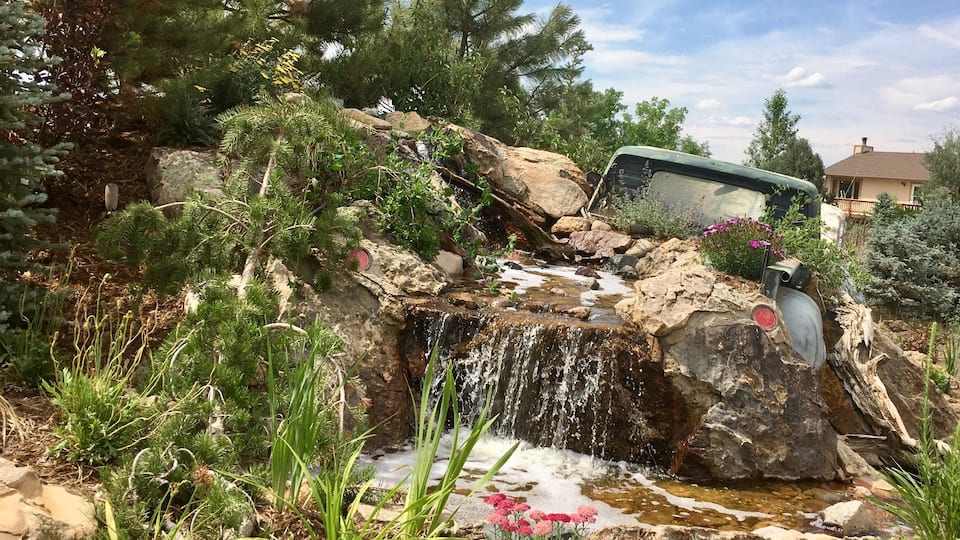 The back view of their unique water feature at The Sprucery’s entrance to nursery.