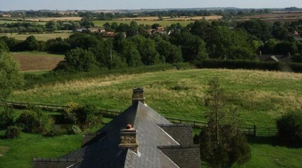 From the top of Wymondham Mill The trees in the centre of the photograph follow the line of the road from Waltham into the village of Wymondham. The buildings in the foreground are attached to the craft centre and tea rooms and the eastern end of the village, in SK8518, is in the left middle distance.