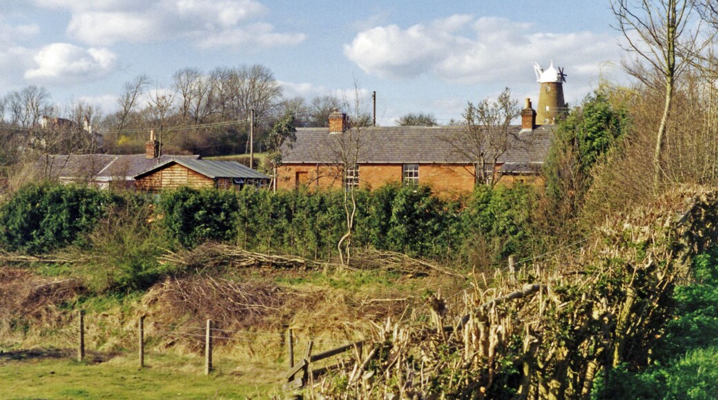Remnants of railway buildings at Edmondthorpe & Wymondham, 1994. View northwards, across the former Saxby (left) - Bourne (right) line. To the left are the preserved Navvy Accommodation and behind can be seen Wymondham Windmill