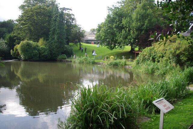 The Lake, Sheffield Marriott Hotel Wedding photographs are being taken on the lawn leading down from the hotel to the lake.